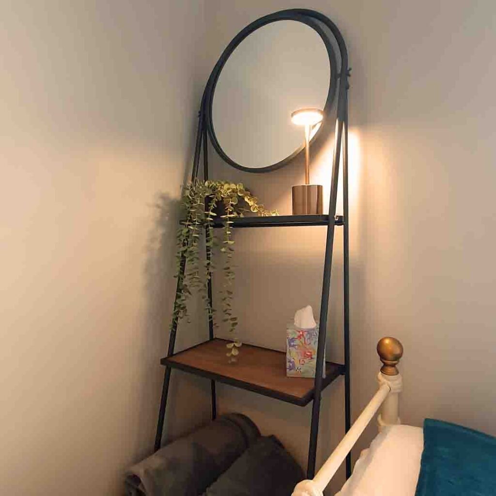 Mirror and single bed photo