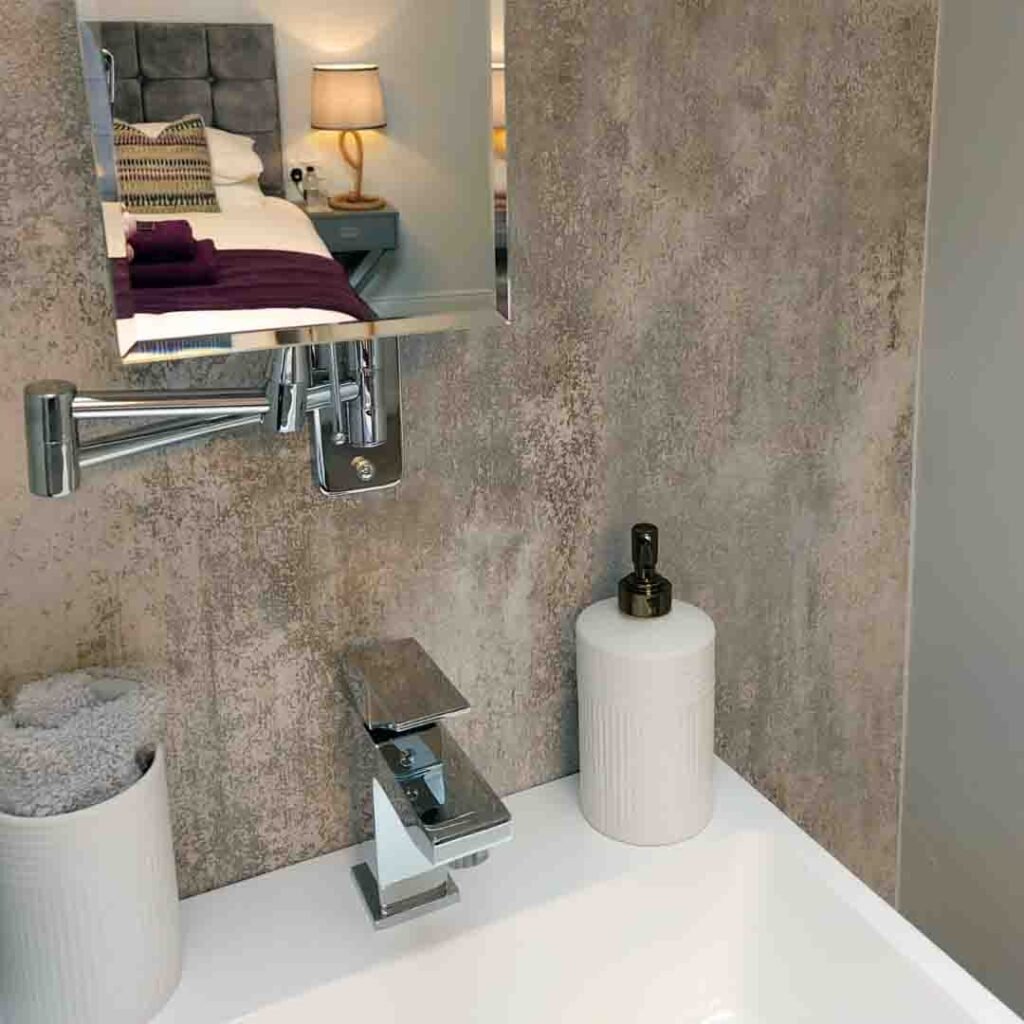 Sink looking into bedroom